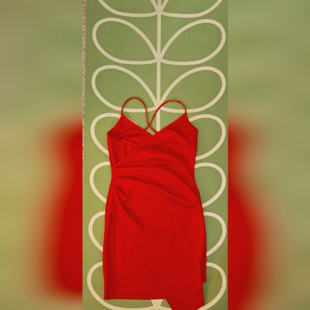 Red form fitting dress by Charlotte Russe